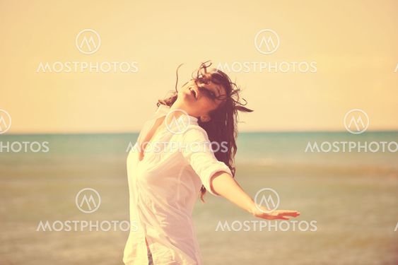 happy young woman on beach