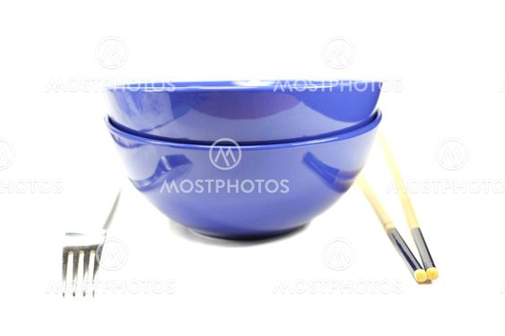Bowls with fork and chopsticks