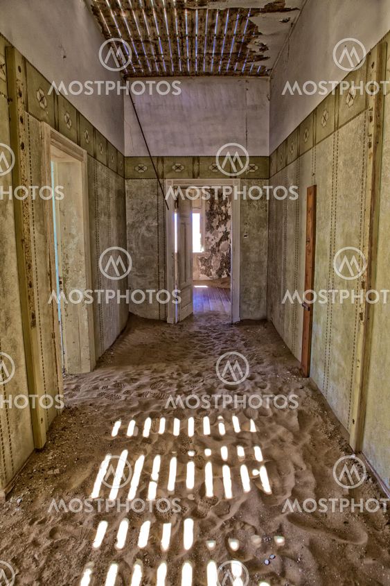 interior of an old house full of sand in kolmanskop's ghost town namibia africa