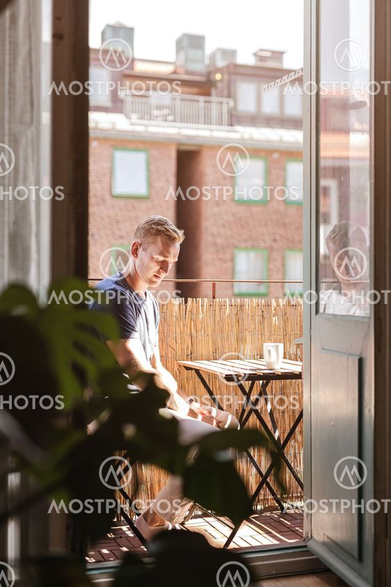 Calm man drinking coffee in the morning