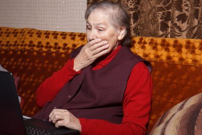 old woman using laptop