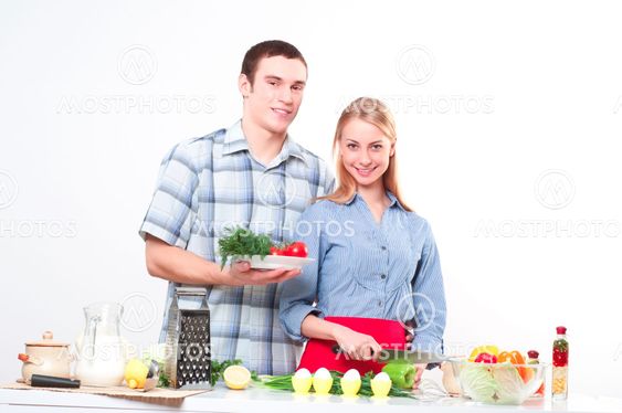 couple of cooking together