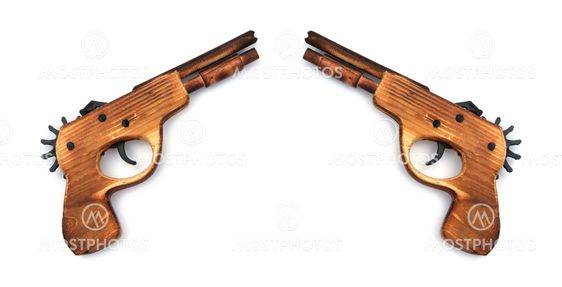 Toy wooden gun , on a white background
