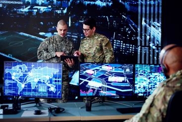 Cyber Technology Operator Monitors Surveillance Cameras