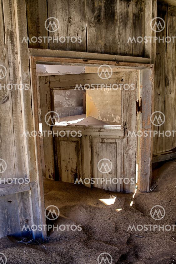 house overtaken by dune sand at kolmanskop near luderitz namibia africa