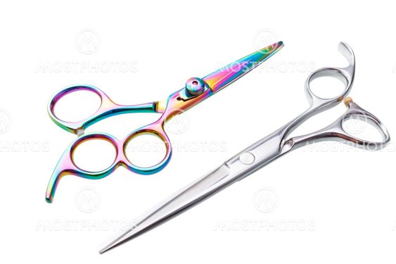 Two sets of Professional hairdressing scissors isolated, with clipping path