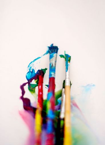 Paint, brushes and creativity with colour, canvas and...