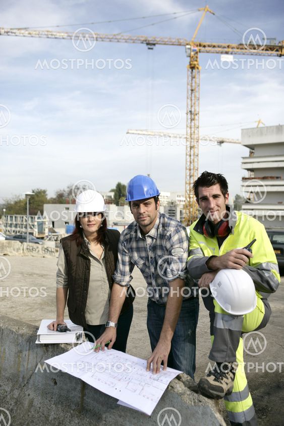 A team of construction workers working together