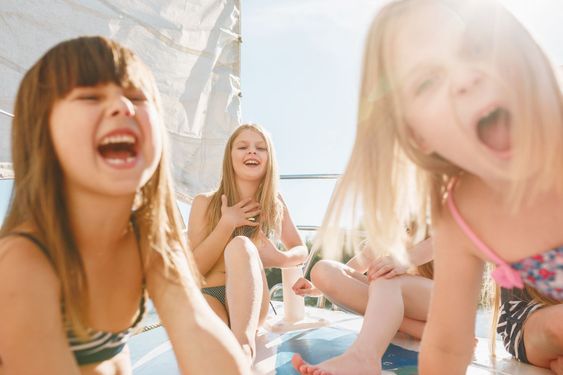 The children on board of sea yacht