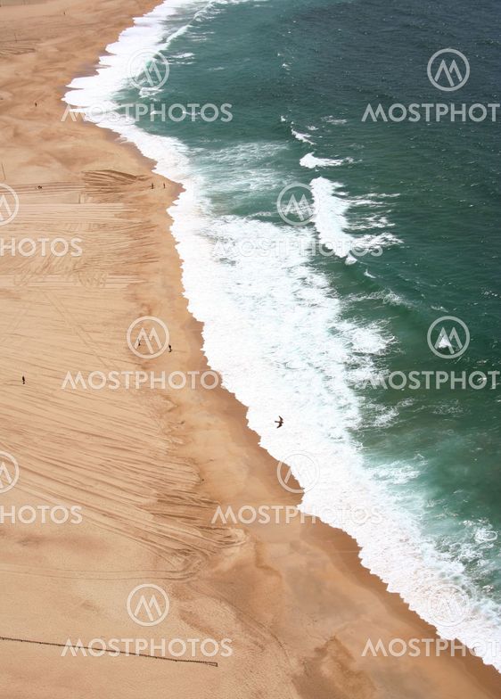 Birdview of the shore of the ocean