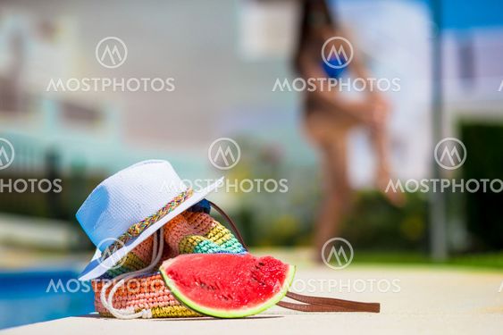 Summer concept- tasty watermelon, straw bag and juice...