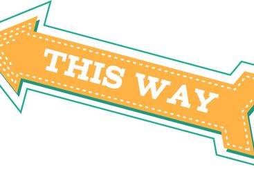 Vintage style arrow sign with a bold This Way message,...