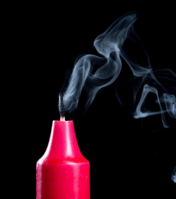 Red Candle Stick With Smoke