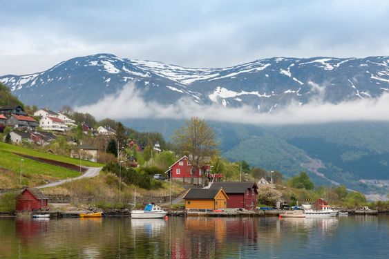 Landscape with mountains. village in Norwegian fjords