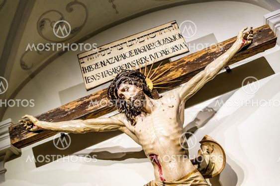 Jesus Christ crucifixion inside of an abbey