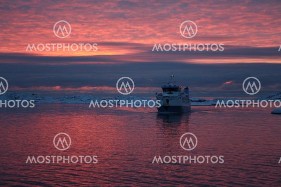 Ferry in winter evening