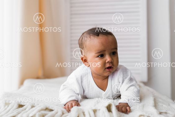 Portrait of a mixed race baby boy