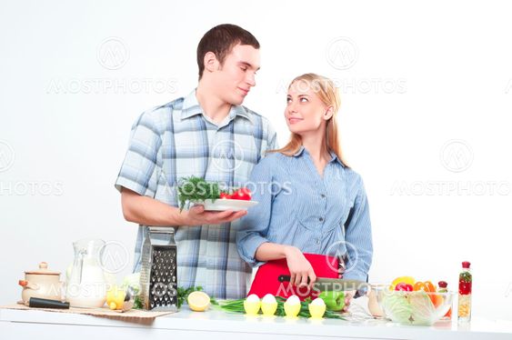 couple of cooking together