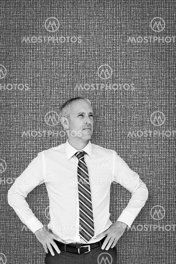 Composite image of thinking businessman