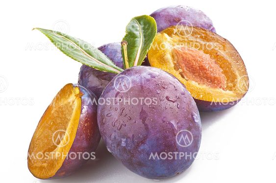 Plums on the white background