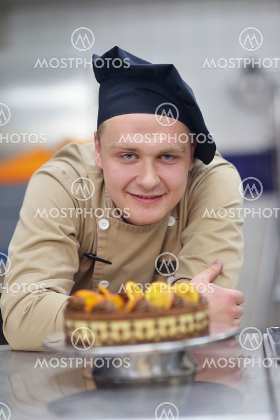 chef preparing desert cake in the kitchen