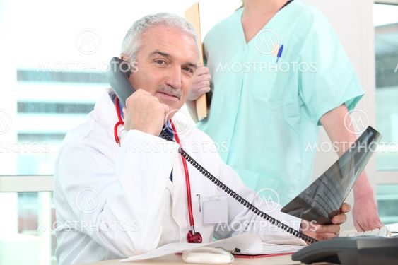 Doctor looking at x-ray