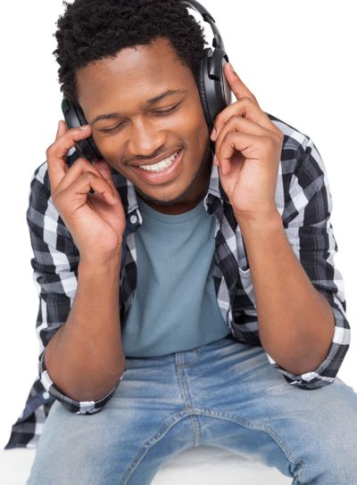 Close-up of a young man enjoying music