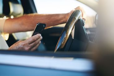 Hands, phone and driving car with map, search and road...