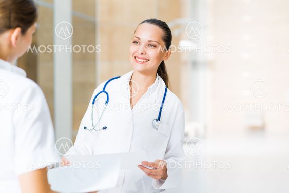 two doctors talking in the lobby