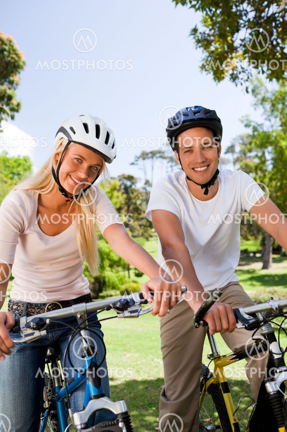 Couple in the park with their bikes