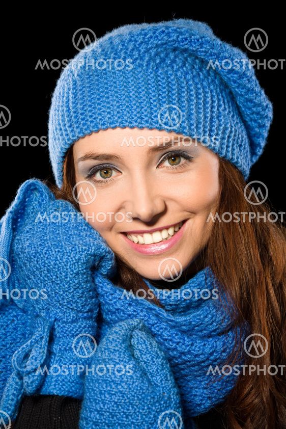 Young happy woman wearing winter cloth