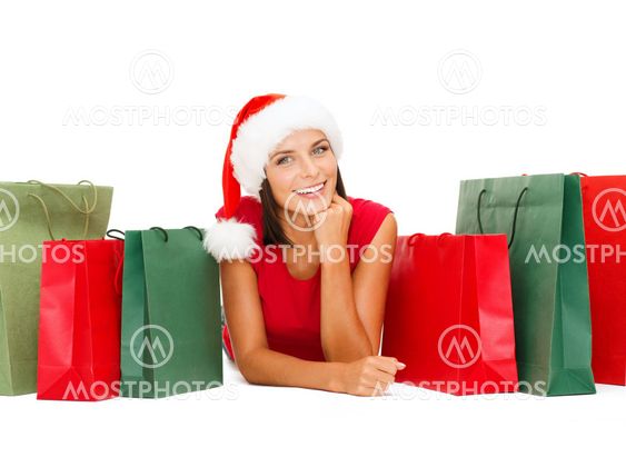woman in red shirt with shopping bags