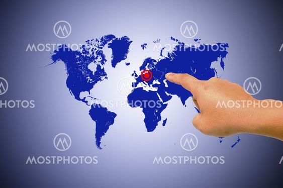 Human hands holding map world