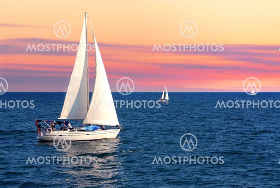 Sailboats at sunset