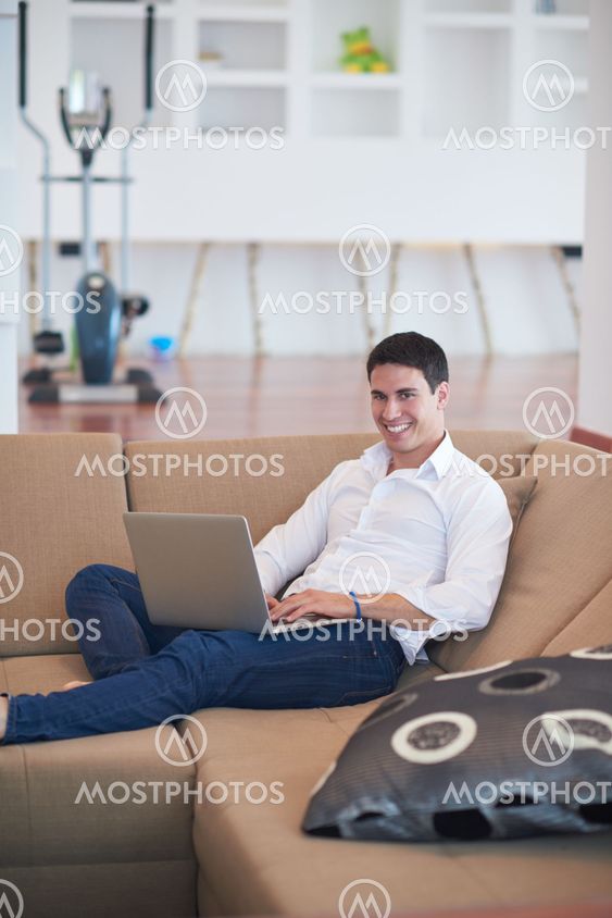 working on laptop computer from home