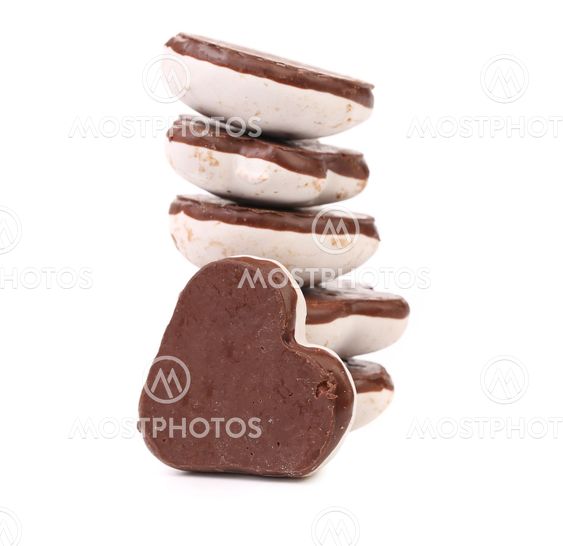 Stack of heart shape chocolate meringues.