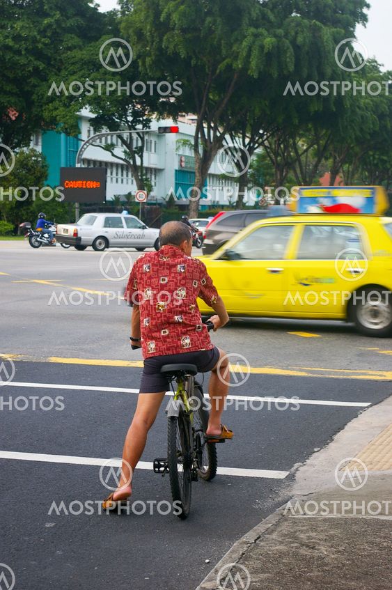 Cyclist and taxi