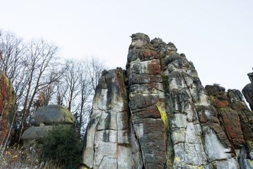 Large rocky rocks. Rocks of rocks. Gray moss-covered rocks