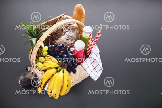 Basket filled food fruits drinks picnic summer rest