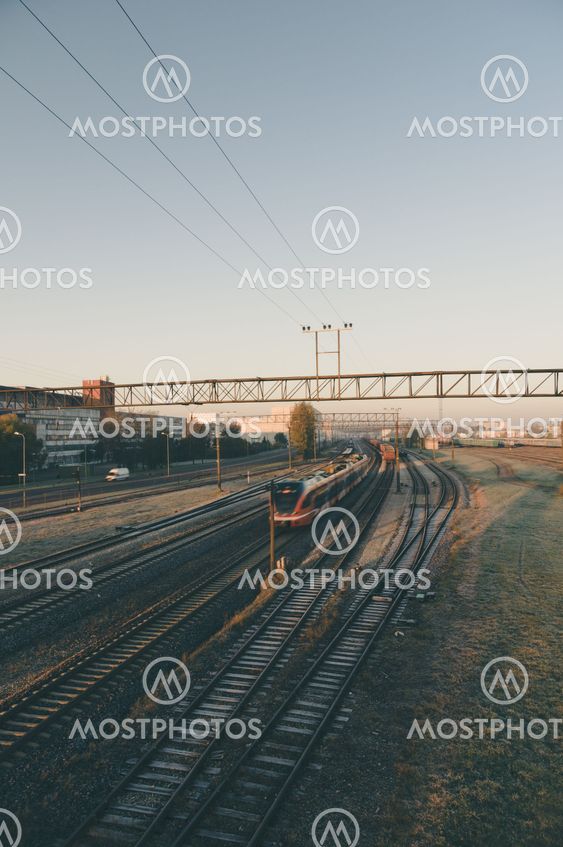 Motion of modern electric train at dawn