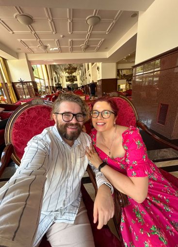 Smiling couple enjoying their time together in a...