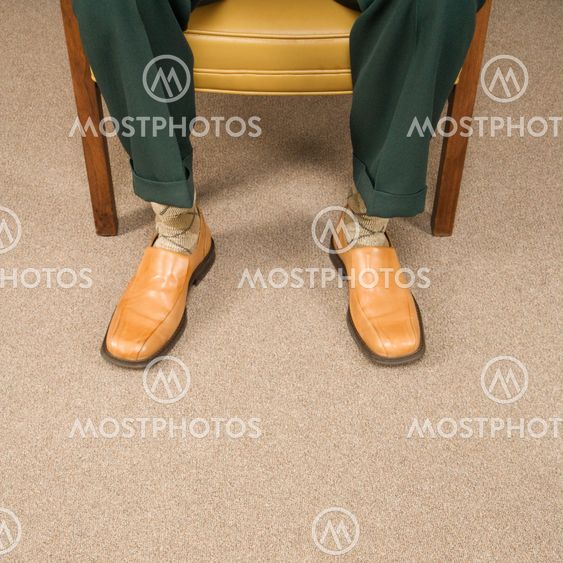 Man wearing dress shoes.