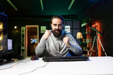 Ecstatic man having burst of joy after being victorious...