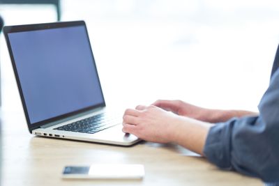 businessman working using a laptop in startup office