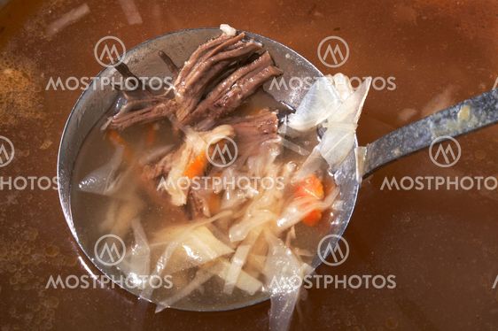 ladle with meat