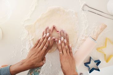 Baking, dough and hands of parent with child in kitchen...