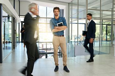 Busy business people, motion blur and tablet in office...