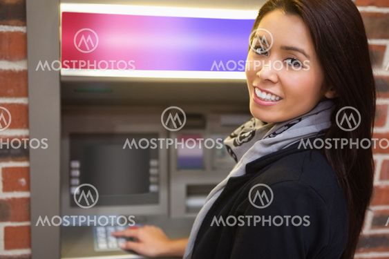 Woman withdrawing cash