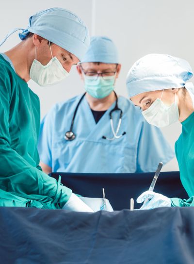 Surgical doctor in full concentration on operation