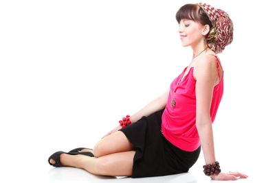 Full length woman in a turban isolated